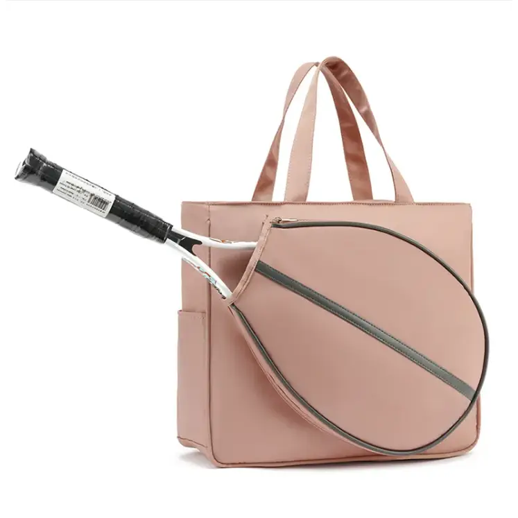 CourtTheory Tennis Pro portable shoulder bag with adjustable strap, designed for carrying tennis gear and accessories.